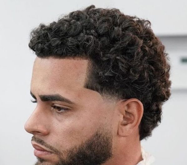 72. Short Curly Haircut for Men with Receding Hairline