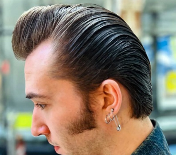 80. Textured Pomp for Men with Hairline Shift